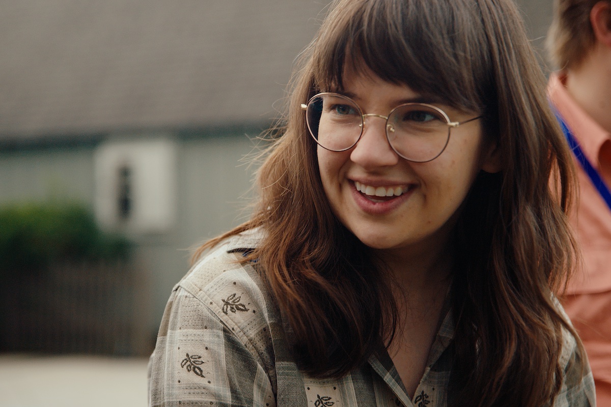 Woman Smiling wearing glasses